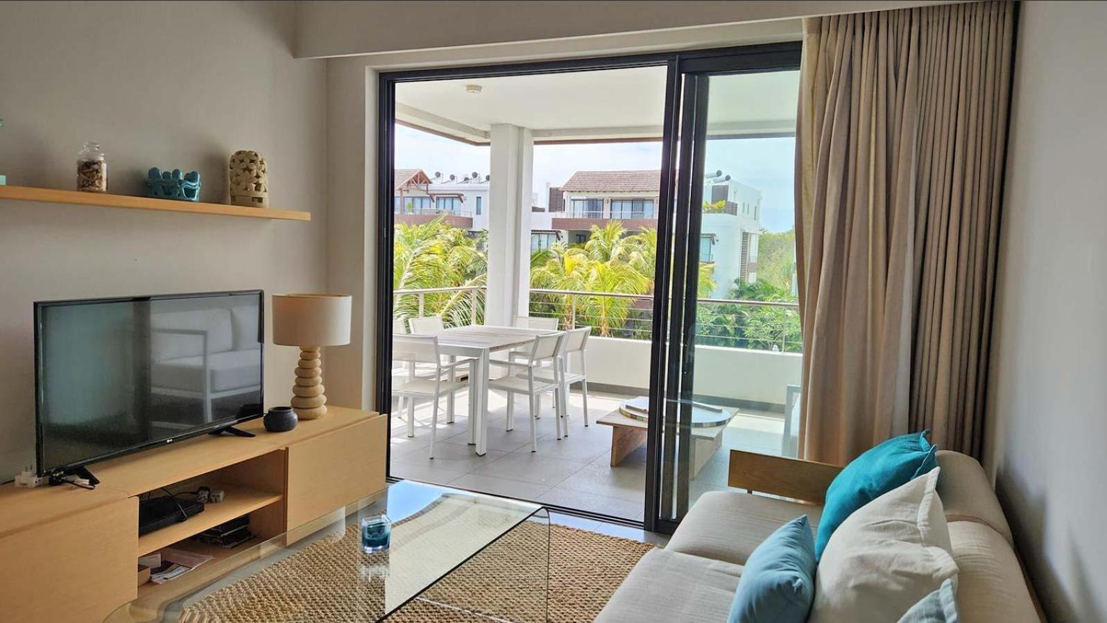 Appartement Le Dauphin Du Lagon Bleu - Plages De Mont Choisy Et De Trou Aux Biches Grand Baie Exterior foto